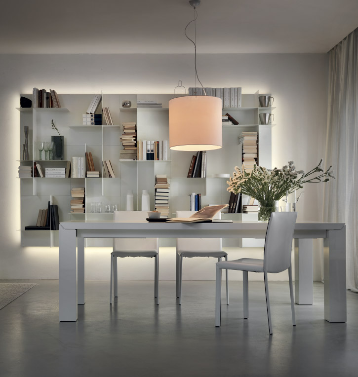 White modern Italian dining table, in a Toronto kitchen design showroom, used in meeting with homeowners, designers, architects, builders and developers